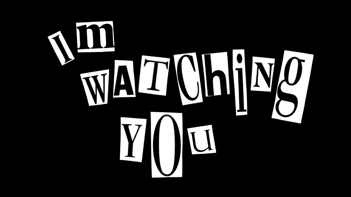 Note on a black background that reads I'm watching you